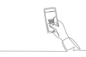 mains de dessin d'une seule ligne tenant un smartphone avec une image de panier et un écran tactile. concept de mode de vie numérique, internet et gadgets. ligne continue dessiner illustration vectorielle graphique de conception vecteur