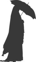 silhouette indépendant émirats femmes portant abaya avec parapluie noir Couleur seulement vecteur