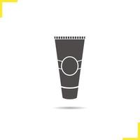 icône de tube de crème. symbole de silhouette de dentifrice ombre portée. crème après-rasage. espace négatif. illustration vectorielle isolée vecteur