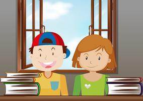 Garçon et fille lisant dans la salle de classe vecteur