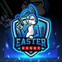 mascotte de lapin de pâques tenant une arme. création de logo esport vecteur