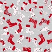 modèle vectorielle continue avec différentes chaussettes de Noël. motif dessiné à la main pour les vacances d'hiver. modèle sans couture pour cartes, papiers d'emballage, affiches et tissu. vecteur