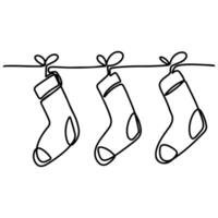 Noël chaussettes guirlande dans Célibataire ligne style. un continu ligne dessin. illustration isolé sur blanc Contexte. vecteur
