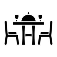 icône de glyphe de table à manger vecteur
