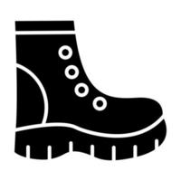 icône de glyphe de chaussures de construction vecteur