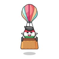 mascotte du drapeau hongrois chevauchant une montgolfière vecteur
