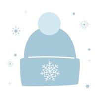chapeau bleu d'hiver chaud pour l'automne ou le printemps, un accessoire pour un homme ou une femme. décoré d'un flocon de neige et d'un pompon. tissu duveteux. illustration vectorielle simple dans un style plat isolé sur blanc vecteur