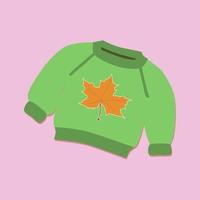 pull en tricot vert avec une feuille d'érable jaune représentée sur un fond lilas vecteur