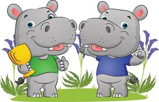 le couple d'heureux gagnant d'hippopotame tient le trophée et fait la fête vecteur