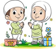 un jeune garçon et une jeune fille musulmans s'offrent un cadeau vecteur