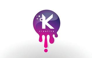 k lettre splash logo. conception de lettre de points et de bulles violets vecteur