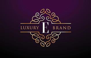 e lettre logo design monogramme de luxe.royal vecteur