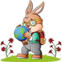 le lapin intelligent tient un globe