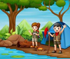 scout garçon et fille en uniforme explorant la forêt vecteur