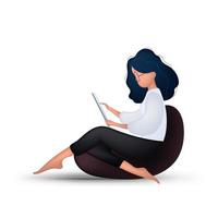 une fille avec une tablette est assise sur un pouf. vecteur de style dessin animé volumétrique.