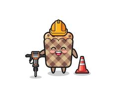 mascotte de travailleur routier de muffin tenant une perceuse vecteur