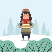femme avec un gâteau dans un paysage de neige vecteur
