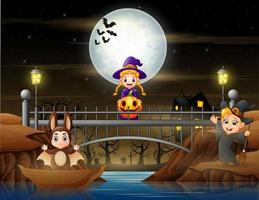 enfants heureux en costume d'halloween célébrant sur le pont vecteur