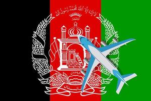 illustration vectorielle d'un avion de passagers survolant le drapeau de l'afghanistan. le concept de tourisme et de loisirs. vecteur
