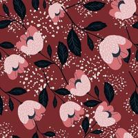 beau motif sans couture de fleurs vintage sur fond rouge. vecteur