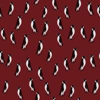 motif harmonieux d'animaux exotiques abstraits avec ornement de pingouins de couleur noir et blanc. fond marron. vecteur