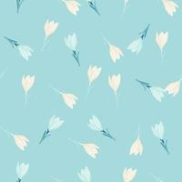 motif floral mignon aléatoire sans couture avec des silhouettes de petites fleurs de crocus sur fond bleu pastel. vecteur