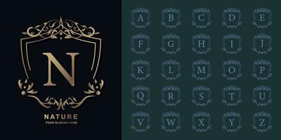 lettre n ou alphabet initial de collection avec modèle de logo doré cadre floral ornement de luxe. vecteur