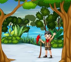un garçon scout avec un drapeau rouge dans la forêt d'hiver vecteur