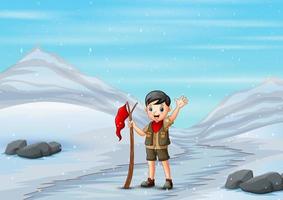 garçon scout marchant sur une route enneigée en hiver vecteur