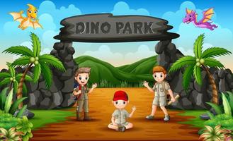 Heureux les garçons explorateurs agitant dans le parc Dino vecteur