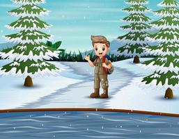 le scout explorant la nature dans un paysage d'hiver vecteur