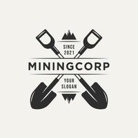 mining corp et logo vintage de deux pelles croisées vecteur