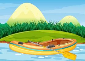 bateau gonflable avec pagaie dans un paysage naturel