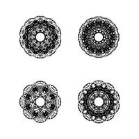 ensemble de 4 ornements de mandala isolés. illustration de voile. vecteur