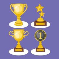 quatre icônes de récompenses d'or vecteur