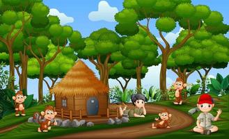 les enfants safari avec des singes à la campagne