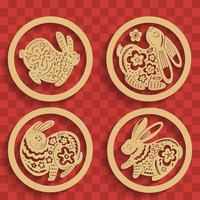 silhouette de lapin doré dans diverses poses dans des cercles dorés. collection d'éléments pour la décoration du nouvel an chinois. badges 3d avec ombres. conception d'or réaliste de vecteur. vecteur