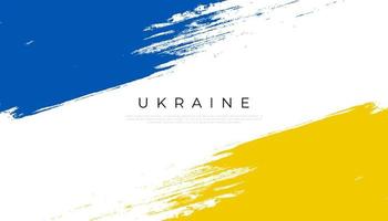 drapeau de l'ukraine avec concept de brosse. drapeau de l'ukraine dans le style grunge. priez pour l'Ukraine. pinceau peint à la main drapeau du pays ukraine vecteur