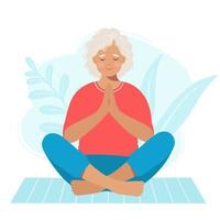 Senior mature femme pratiquant la position zen sur un tapis de yoga isolé sur fond blanc vecteur