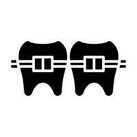icône de glyphe d'accolades dentaires vecteur