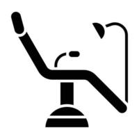 icône de glyphe de fauteuil dentaire vecteur