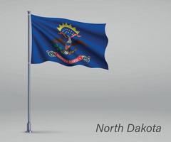 agitant le drapeau du dakota du nord - état des états-unis sur le mât vecteur