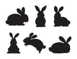 silhouettes de lapins de Pâques isolés sur fond blanc. collection de dessin animé plat de lapins. vecteur