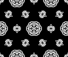 motif floral vectorielle continue. motifs ronds noirs et blancs sur fond noir. texture vintage pour tissu, carrelage, papier peint ou emballage. vecteur