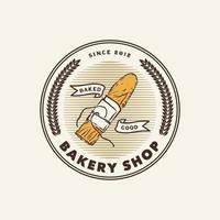 étiquette de logo de boulangerie vintage dessiné à la main vecteur