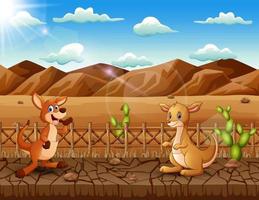 kangourous de dessin animé dans le paysage de terre aride