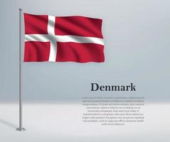 agitant le drapeau du danemark sur le mât. vecteur