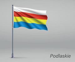 agitant le drapeau de la voïvodie de podlaskie - province de pologne sur le drapeau vecteur