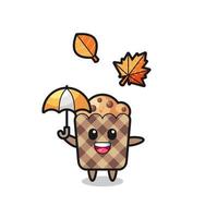 dessin animé du muffin mignon tenant un parapluie en automne vecteur