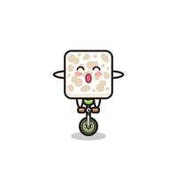 le mignon personnage de tempeh fait du vélo de cirque vecteur